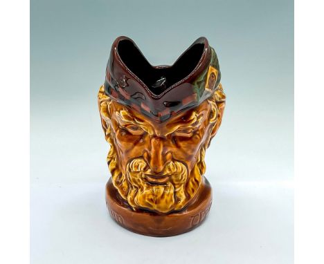 Produced as a promotional item for the D. &amp; J. McCallum Distillery in Scotland, this jug exists in two different color va