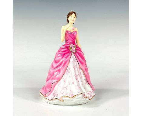 Petite Figure of the Year 2017. Pink and white dress; gilt highlights. Royal Doulton backstamp. This item has its original bo