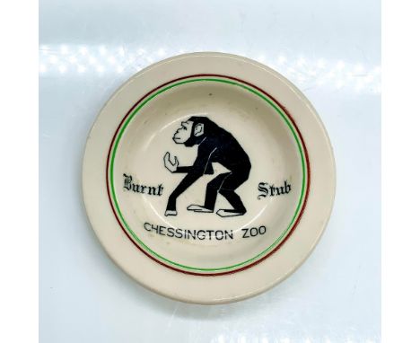 Ceramic dish with an illustration of a chimpanzee and the words Burnt Stub and Chessington Zoo. Royal Doulton backstamp on bo