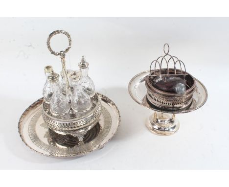 Silver plated ware to include rotating cruet frame containing five non-contemporary bottles, tazza, circular tray, two bottle