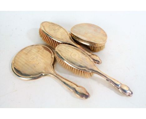 Matched silver four piece dressing table set, various dates and makers, the engine turned backs initialled W (4)