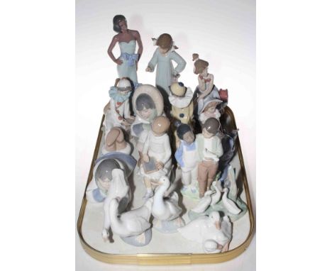 Fourteen Nao figures and one Lladro piece of Girl on Telephone.
