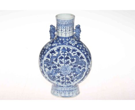 Antique Chinese blue and white moon flask vase with dragon, foliate and blossom decoration, 25cm.