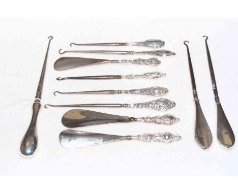 Collection of silver handled button hooks, etc.