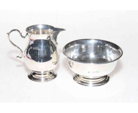 Silver baluster cream jug and sugar basin by Charles Stuart Harris, London 1898.