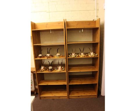 Five John Lewis pine finish open shelf units.