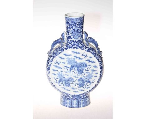 Antique Chinese large blue and white moon flask vase with panels of foo dogs with balls and dragon shoulder handles, 36cm.