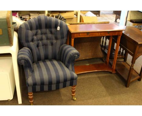 Occasional tub chair in button backed striped fabric and two drawer console table.