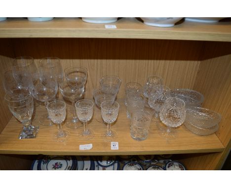 A shelf of glassware.