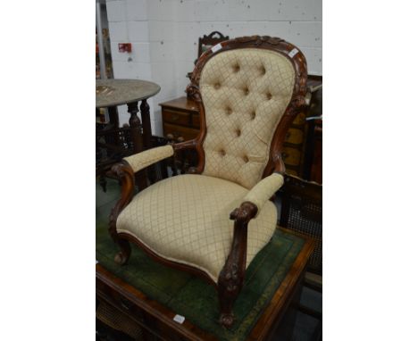 A child's Victorian style button back armchair.