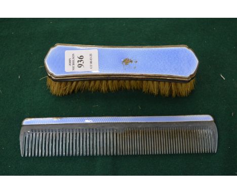 Silver enamel brush and comb.