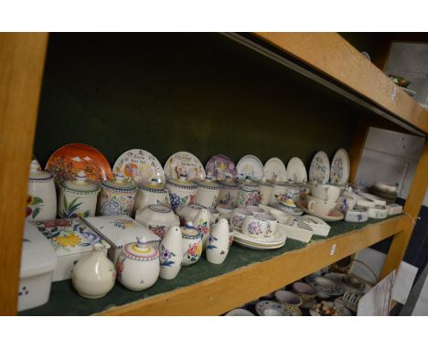 A good collection of Poole pottery preserve jars and other items.