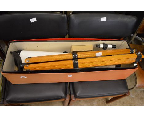 An astronomical telescope and tripod stand, boxed.
