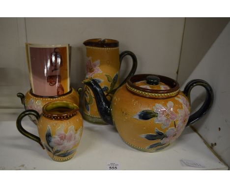 A Royal Doulton four piece tea set comprising teapot, hot water jug, cream jug and sugar bowl.
