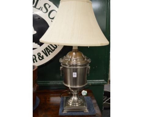 A good large brushed steel urn shaped table lamp and shade.