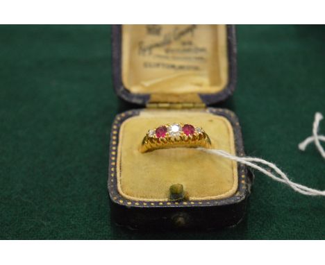 An 18ct gold diamond and ruby five stone ring.