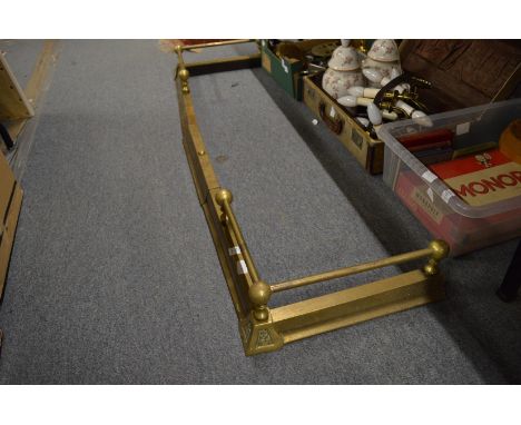 A brass adjustable fender.