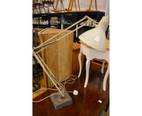 An early angle poise lamp.
