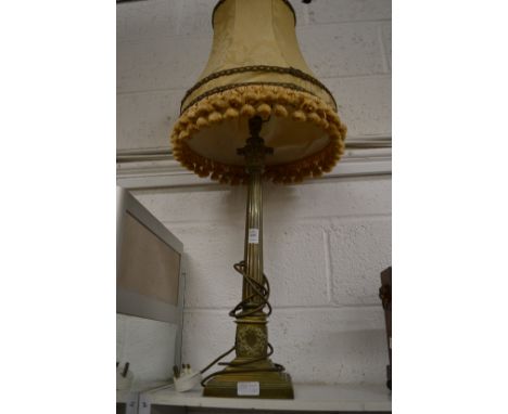 A brass corinthian column style table lamp base.