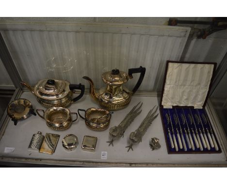 Four piece plated tea and coffee service and other items of plated ware to include a cock and hen pheasant.