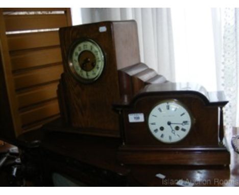 Edwardian mahogany cased striking mantel clock and an oak cased Art Deco ditto