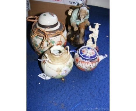 Carved ivory figure, oriental teapot, etc.