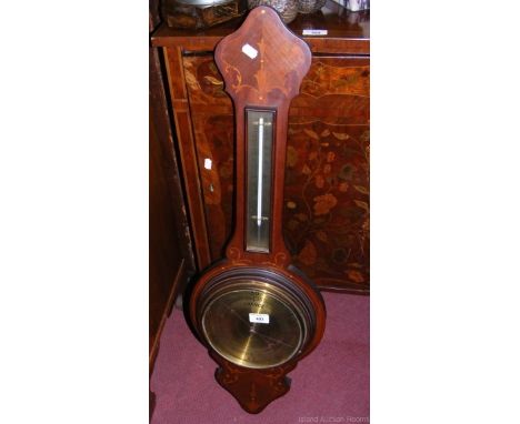 An inlaid wall barometer/thermometer