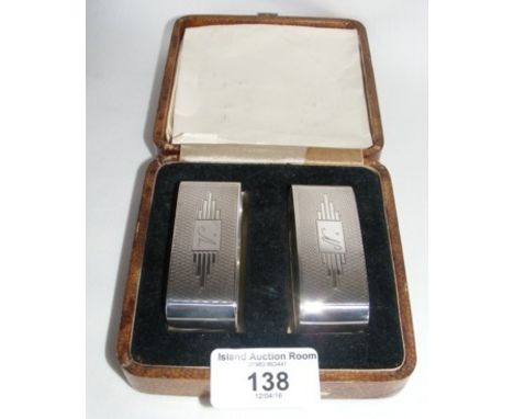 Pair of Art Deco engine turned silver napkin rings in presentation case