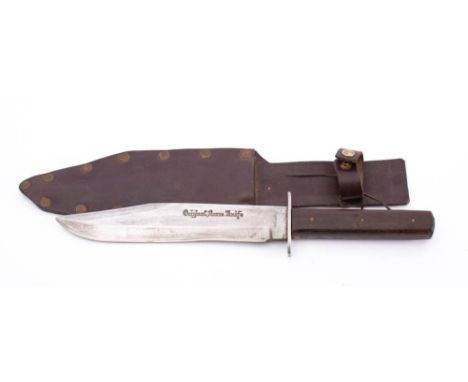 An 'Original Bowie Knife' by Whitby: signed as per title  to clipped back blade, plain oval hilt and two piece wooden grip in