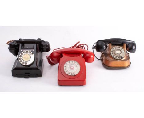 A mid 20th century GPO black Bakelite telephone: with plated rotary dial and exchange button, together with a Red Bakelite 70