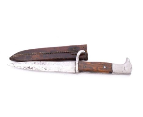 A German combat/ trench knife straight single edge blade over wilt with single quillon,: two piece wooden grip in a leather s