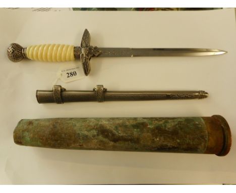 A reproduction Luftwaffe dagger: together with a Korean War 40mm shell casing (2)* Notes  Militaria artefacts are reproduced 