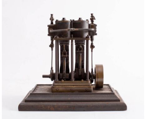 Stuart or similar. A live steam scale model of a vertical marine engine: 2 3/4inch sold brass flywheel, double acting pistons