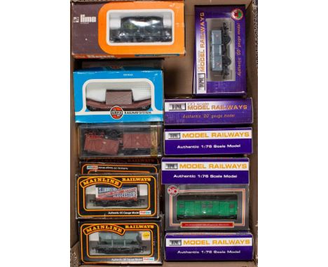 Dapol, Mainline and other HO/OO scale.: A boxed group of rolling stock  including wagons and tankers.