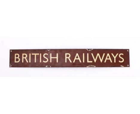 A BR (W) enamel 'British Railways' sign: cream text on a brown ground, 10 x 68.5cm