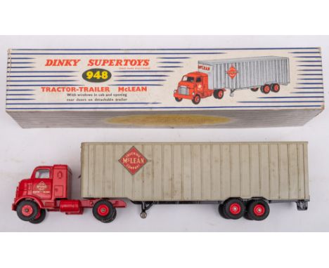 Dinky 948 Tractor Trailer 'McLean': in red and silver with black treaded tyres, in original box. 