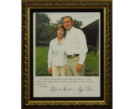 Framed Photograph of President George and Laura Bush with printed inscription with signatures to Ms. Tova Leidesdorf. Good Co