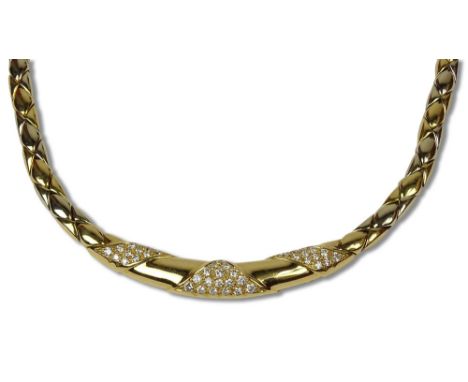 Vintage Cartier 18 Karat Yellow Gold and Round Cut Diamond Flexible Link Necklace. Diamonds E-F Color, VS Clarity. Signed Car