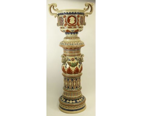 Large Mettlach Three (3) Piece Jardiniere. Figural Motif. Minor Losses and Crazing or in Good Condition. Measures 50-1/2 Inch
