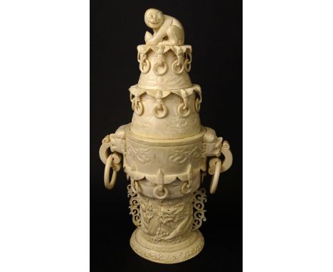 Chinese Republic Period Carved Ivory Covered Urn with Buddhist Lion Mask Ring Handles, Monkey Finial and Relief Dragon Decora