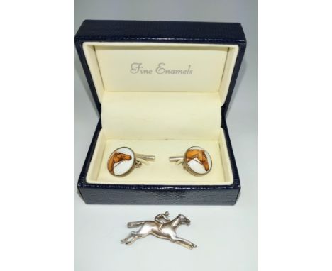 A bored pair of 925 silver cuff links with fine enamel horse head decorations and a small silver horse with jockey brooch. 