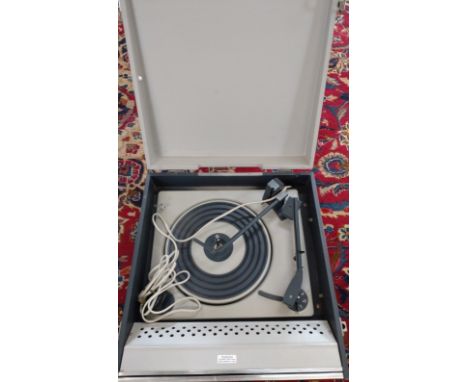 A portable record player, some markings to lid 