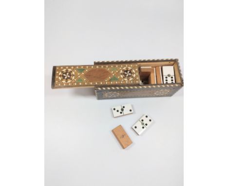 An ornate inlaid set of dominoes. Vintage. 