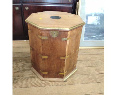 A hexagonal hardwood and brass bound box. Vintage. Locked. 