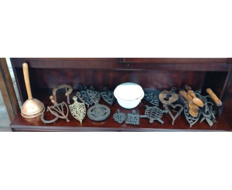 A collection of antique/ vintage kitchenalia including a number of flat iron stands, a ceramic steamer and a 'Wafax' washing 