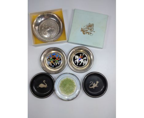 A collection of six various small silver and enamel decorated pin dishes. 