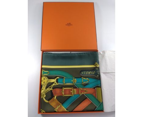 A vintage Hermes scarf in original orange box. Label reads 'Cavalcadour' 90cm Vert 001698541 