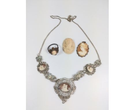 A cameo, necklaces, a ring (size J)and two pendants. Vintage. 
