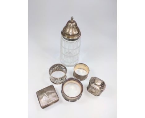 Miscellaneous sterling Silver, various dates and makers. Comprising, a sugar caster, a Dutch box, three napkin rings and a sn