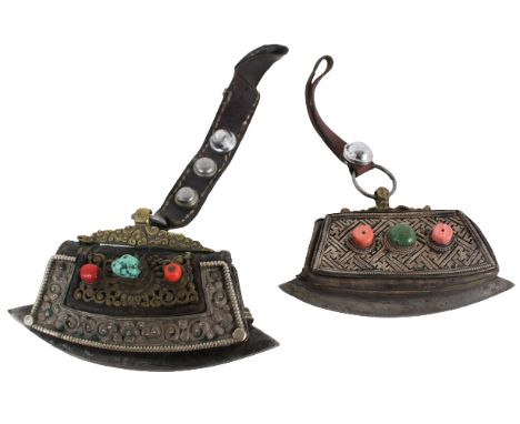 Two Tibetan Metal Mounted Leather Fire Starter Pouches 19th Century. Each with a convex steel striking plate fitted to a leat